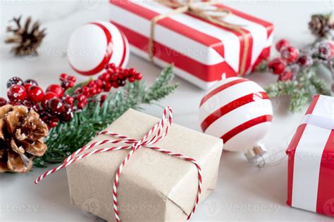 Christmas or New Year holiday presents wrapped in craft and striped ...