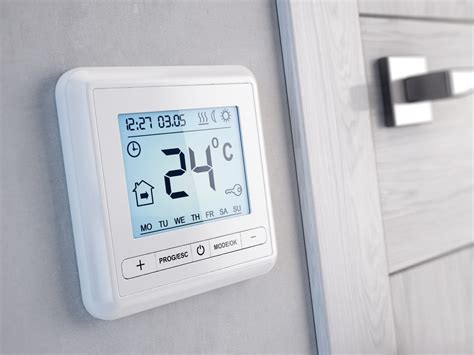 Image result for Thermostat with Emergency Heat Switch