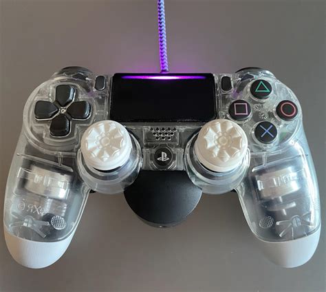 Image result for PS4 Controller Over a Book