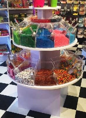 Image result for Retail Display Fixtures Wooden Tiered Roundtables