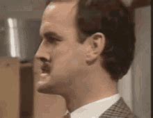 Image result for John Cleese Argument Clinic GIF
