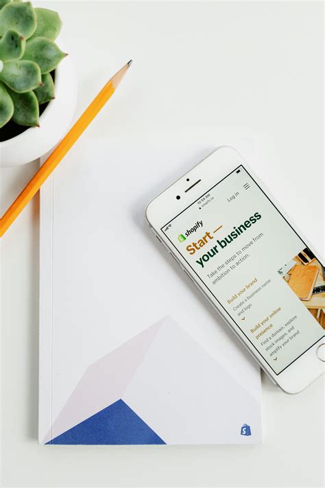 Image result for Silver iPhone On Table