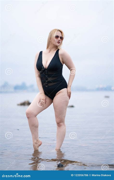 Image result for Plus-Sized Blonde Runway Model in Swimsuit