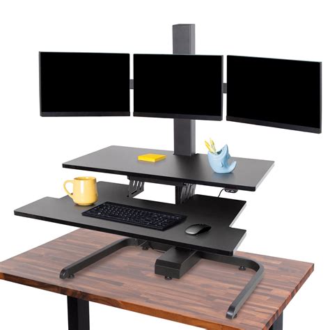 Toradh íomhá ar Three Monitor Stand