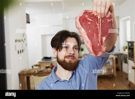 Person Holding A Steak に対する画像結果