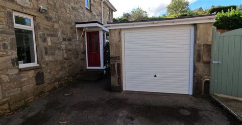 Up and Over Garage Door Fitting Instructions に対する画像結果