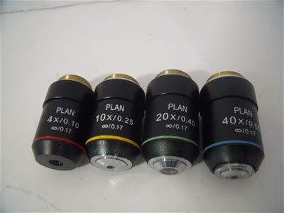 4 - Microscope Plan 4X/.10, 10X/0.25, 20X/0.40, 40X0.65 Microscope