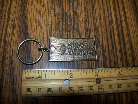 Sigma Designs Vintage Keyring Computer Advertising