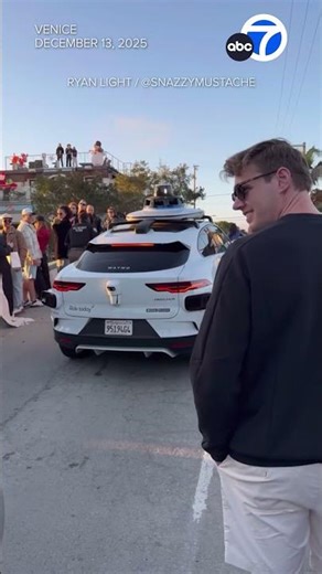 Waymo stops traffic at Venice Beach Christmas parade