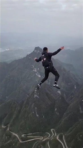 Another day of challenging and breaking records #TianmenMountain #ZhangShupengWingsuit