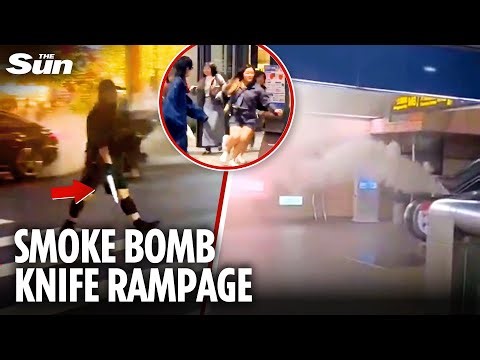 Horror moment knifeman launches smoke bombs before stabbing rampage leaves at least three dead
