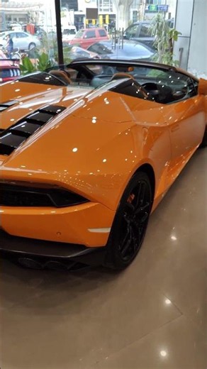 Lamborghini Huracan Spyder. Orange, loud and impossible to ignore.