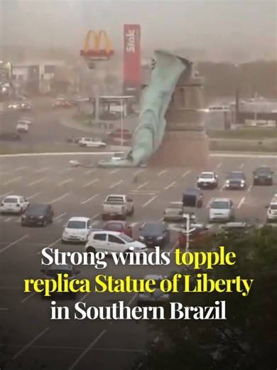 A view shows a replica of the Statue of Liberty, a symbol of a Brazilian retailer called Havan, toppled after being hit by strong winds that struck the city of Guaiba, Brazil, on December 15, 2025. Video via X. #DawnToday