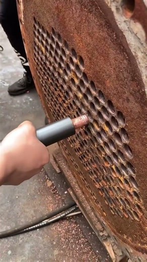Tube extraction process for condenser copper tubes of central air conditioners