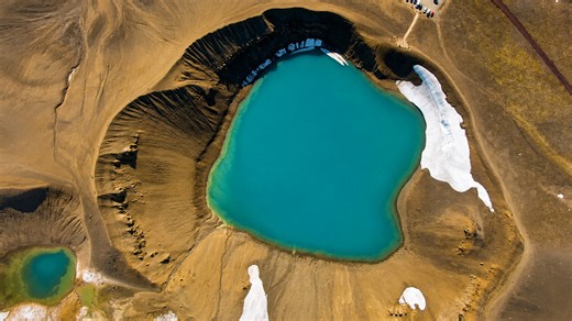 Nature filled this volcano with blue water