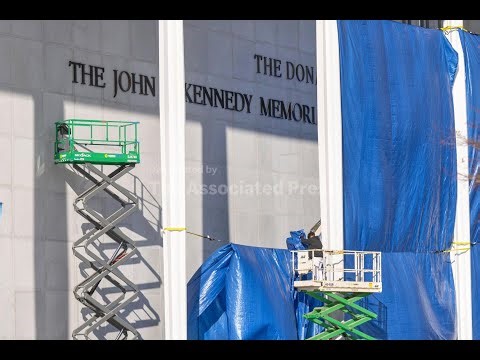 Workers start adding Donald Trump's name to the Kennedy Center