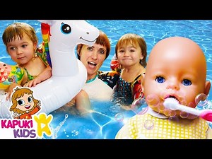 Baby Annabell & baby dolls at the swimming pool. Kids playing toys & family fun video for kids.