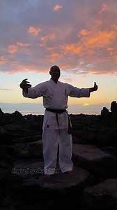 Shihan Jean-Luc Vedapodagom performing kata on shore of the Indian Ocean on volcanic lava. Reunion