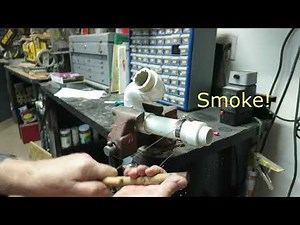 Cut PVC or other plastic pipe using a home-built wire saw.