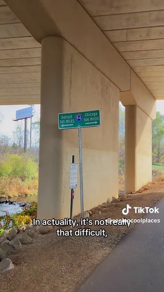 When traveling between Detroit and Chicago on Interstate 94, there’s a sign that lets people know they’re in the middle-ish of the two cities. But, oddly enough, to see the sign, you have to go—under I-94. Right in between these railroad tracks and Portage Creek, a path brought me to the mileage marker. But first, I had to get off the highway, go the wrong way, get to a dead end, and go back to find the access point. In actuality, its not really that difficult, but, I’m just not good at some thi