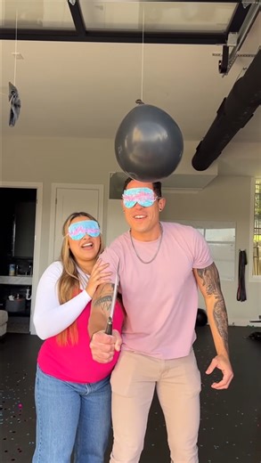 Balloons explode at a gender reveal with a stunning surprise