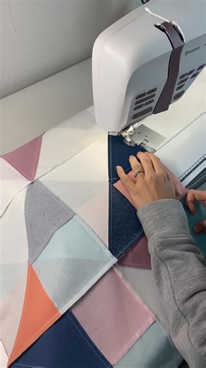 Another week means more new featured quilt patterns! Check out the Cirrus Quilt Pattern: This modern quilt pattern features scrappy looking shapes that mimic Flying Geese, and can be made using precuts like 5” and 10” squares. The pattern also includes a gingham-style version as well for maximum versatility. Grab Cirrus today in my shop for 20% off! #homemadeemilyjanepatterns #cirrusquilt #scrappyquilt | Homemade Emily Jane