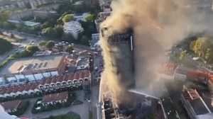 Italian firefighters have battled a high-rise blaze in Milan, Italy.
