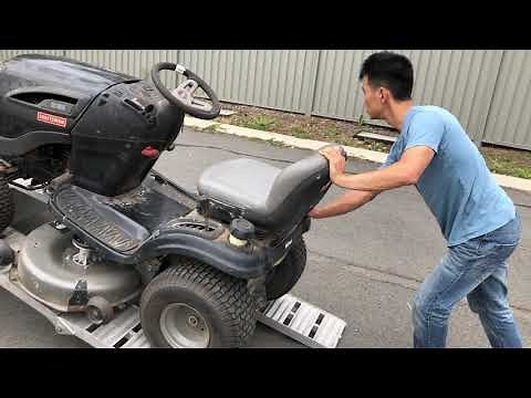 The Right Way to Load a Lawn Tractor on a trailer. loading and unloading lawn mower on a trailer