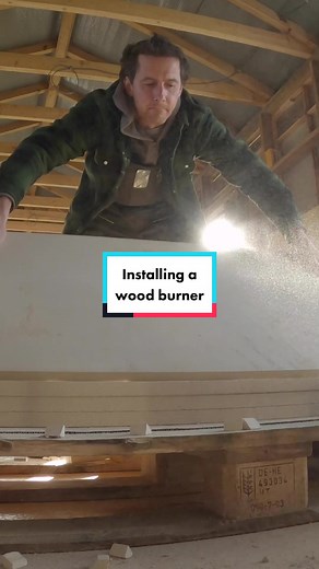 Installing our refurbished wood burner into the cabin #logburner #woodburner #cabin #logcabin #offgrid #homestead