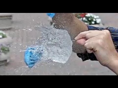 The Physics of Popping Water Balloons