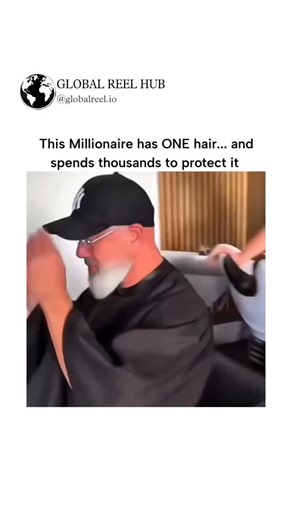 GLOBAL REEL HUB™ on Instagram: "The post showcases a 19-second video of biotech entrepreneur Bryan Johnson undergoing an elaborate salon treatment to safeguard his single remaining hair, part of his $2 million annual anti-aging "Blueprint" protocol aimed at reversing biological age. Garnering 3.1 million views and 7,700 likes within hours, it elicits humorous replies mocking the extravagance, such as fears of accidental hair loss during styling, highlighting perceptions of wealth-fueled vanity.