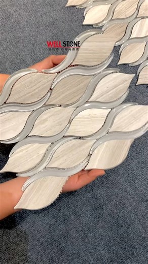 Well Stone Mosaic Xie on Instagram: "✨ Sparkling moment! Grey & white marble meets sinuous glass mosaic — shimmering elegance redefined. ✨ Perfect for modern luxury. ✨ #MarbleDesign #GlassMosaic #LuxuryInteriors #HomeInspo #RenovationGoals #marblemosaic #backsplash #walldecor #mosaicsupplier #beautiful"