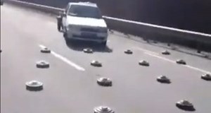 WATCH | Civilians drive through a heavily land-mined highway near Kyiv, Ukraine. Russian forces had earlier placed anti-tank land mines on the highway | #RussiaUkraineConflict | Latest News - https://bit.ly/3Iwbsxh [Video Source: Emine Dzhaparova, First Deputy Minister of Foreign Affairs of Ukraine] #russia #ukraine #NATO #RussiaUkraineCrisis #Zelensky #RussianUkrainianWar #RussiaUkraine #VladimirPutin | The Economic Times