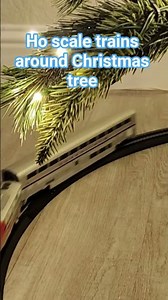 ho scale trains around Christmas tree