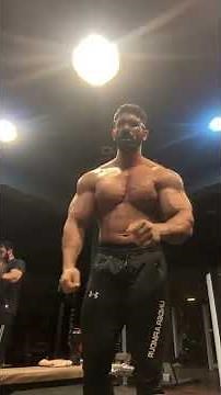 Big Huge Monster Bodybuilder Posing and Flexing in the Gym