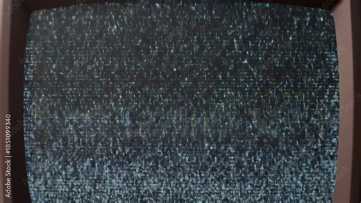 Retro tv static transitioning to clear broadcast signal with vintage screen effects