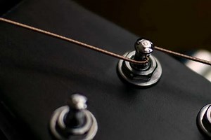 Try This Simple Trick to Restring Your Acoustic Guitar with Ease