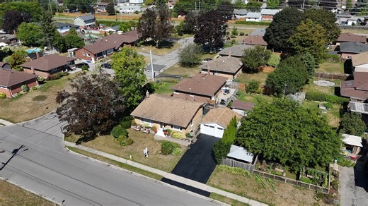 New Price! This beautifully maintained 3-bedroom, 2-bath home offers modern updates, natural light, and a family-friendly location. Nestled in a sought-after neighbourhood, it is just a short stroll to local schools, parks, and community amenities, making it an ideal place to put down roots. Step inside to discover a bright and inviting living room, where large windows let the sunshine pour in, perfect for enjoying a morning coffee or unwinding with family at the end of the day. The thoughtful b