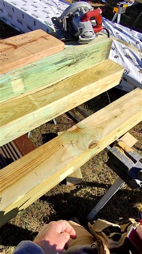 Why we notch our 6x6 posts Setting 6x6 wood posts and notching them for our drop beam on this deck. Clean cuts, tight fits, and proper bearing make all the difference in long-term strength and performance. We’ve got seven of these going in today, so it’s all about precision, speed, and doing it safely. A strong deck starts from the ground up, and when you get the foundation right, everything else falls into place. 💪🛠️ #deckbuildind101 #deckbuilder #deckconstruction #deckframing #carpentry #car