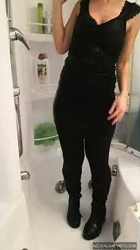 Wetlook - Anna under shower with black skirt, shirt, pantyhose and boots.