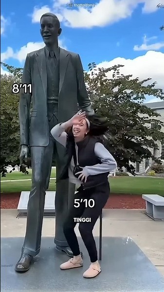 visiting a huge statue to measure our height