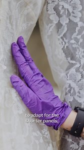 Fashion and function: adapting a 1960s wedding dress for a Disabled bride. Watch as curator Natalie uncovers the hidden details on the dress, revealing how it was carefully adapted to suit its owner, Janet Jones, from south London. Born with a missing hip joint and a dislocated hip joint, Janet had one leg longer than the other, so worked with tailors throughout her life to ensure that her clothing sat straight on her figure. Embellished with flowers, sequins and sparkly trimmings, it reflects J