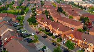 Aerial view: American suburb, serene Canadian suburban scenery. Suburban landscape, epitomizing North American suburban life, tranquility, and charm. Ideal for suburban-themed projects.
