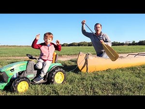 Playing on the farm with real tractors and hay | Tractors for kids