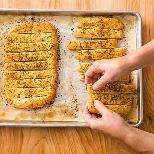 3.3K views · 68 reactions | We wanted a breadsticks recipe that we could make at home—and make better. No matter the flavor variation these restaurant favorites bake up pillowy soft and pulled apart perfectly at the seams: https://cooks.io/2HuhkbF | Cook's Country | Facebook