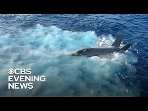 Images emerge of Navy jet crashing into South China Sea