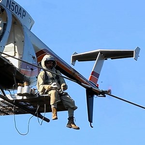 These guys are using a helicopter to repair an electric power line that generates 400,000 volts | Supercar Blondie
