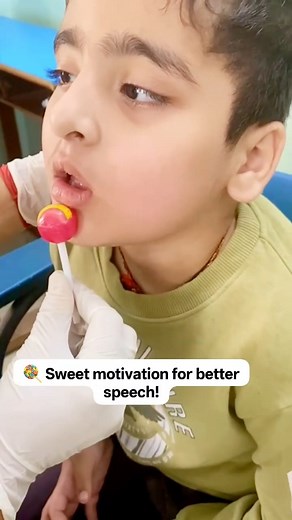 Sweet Motivation For better speech..... In this activity, the therapist uses a lollipop as a fun and motivating tool to encourage tongue movement and oral motor control. The child is guided to lick the lollipop in different directions — up, down, and side to side. This exercise strengthens tongue muscles, improves coordination, and enhances oral awareness, which are essential for clear speech production. It also keeps the session engaging and enjoyable for the child. #SpeechTherapy #OralMotorExe