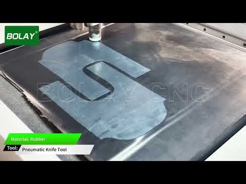Rubber cutting machine with projector and pneumatic knife tool