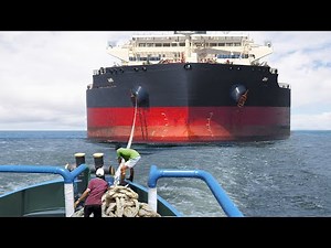 Day in the Life of a Tiny Tugboat Pulling Massive Ships at Sea